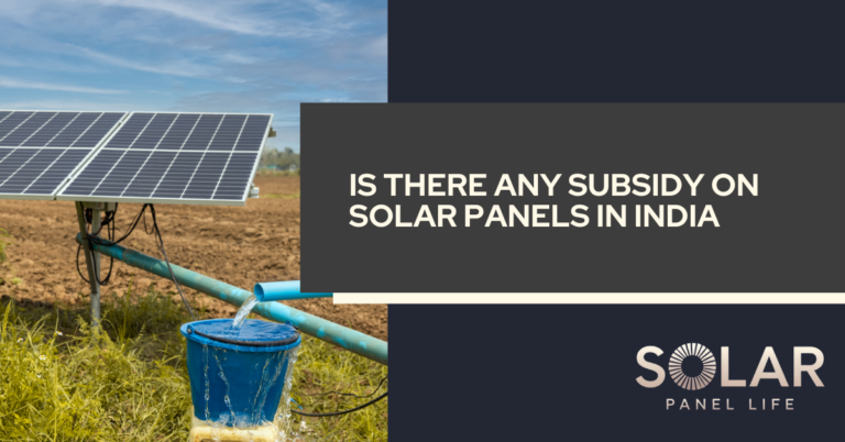 A solar panel installed on a farmland is connected to a water pump system, with a blue bucket catching water being pumped. The image has the text "Is There Any Subsidy on Solar Panels in India" displayed on the right side on a dark background.