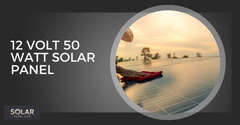 Person cleaning a 12 Volt 50 Watt solar panel during sunset.